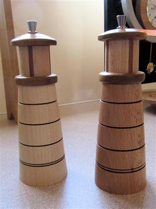 Lighthouse styled salt and pepper mills by Fred Taylor